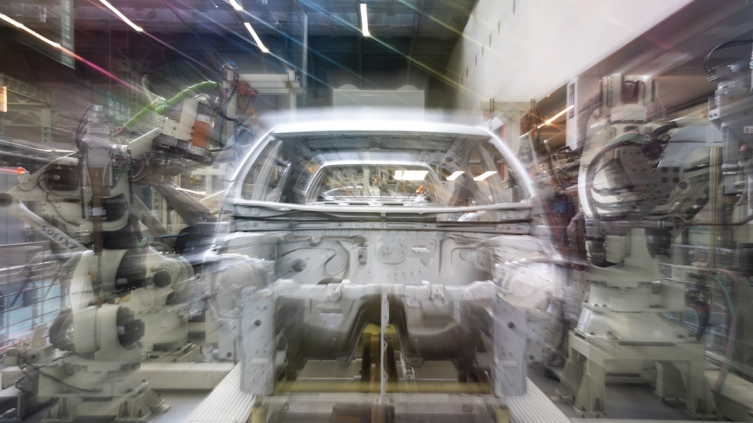 car-assembly-line-with-robotic-arms-and-car-body-rwwaf60fw0w